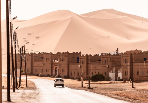 View of Merzouga and sand dunes, gateway to Sahara Desert, Merzouga, Morocco . High quality photo